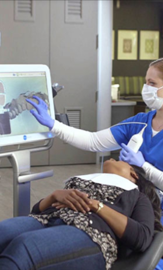 Orthodontist capturing digital dental impressions
